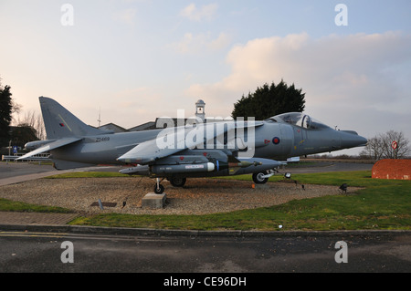 A view of the Harrier Jump Jet on display at the entrance of RAF Wittering in Cambridgeshire Stock Photo