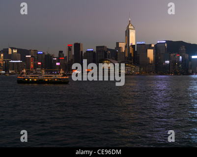 dh  HONG KONG HARBOUR HONG KONG Star Ferry Hong Kong island dusk waterfront buildings HKCEC Central Plaza twilight skyline Stock Photo