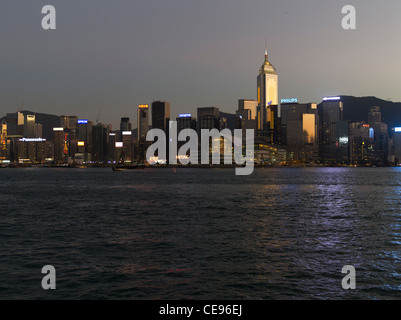 dh  HONG KONG HARBOUR HONG KONG Hong Kong island dusk waterfront buildings HKCEC Central Plaza Tower Stock Photo