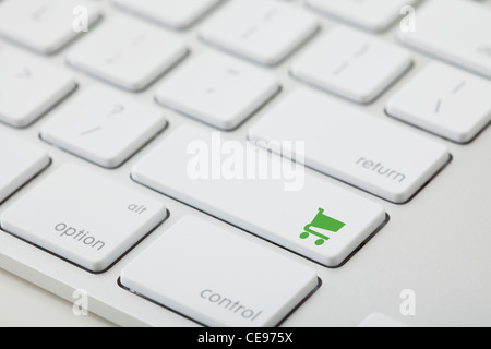 Computer keyboard with shopping cart icon on key Stock Photo