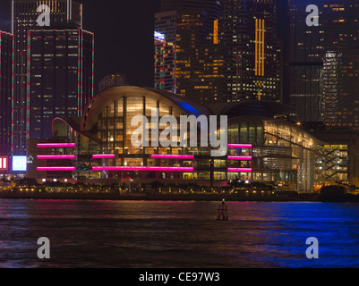 dh Convention Exhibition Centre WAN CHAI HONG KONG Harbour HKCEC building Wanchai waterfront night lights buildings center Stock Photo
