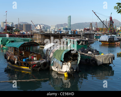 dh typhoon shelter CAUSEWAY BAY HONG KONG causeway bay junk homes anchorage boat china houseboat harbour Stock Photo
