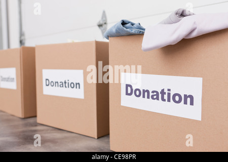 USA, Illinois, Metamora, Cardboard boxes with clothes Stock Photo