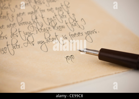 Close-up of love letter and fountain pen Stock Photo