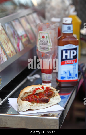 sandwich sausage barm eating on the street Stock Photo