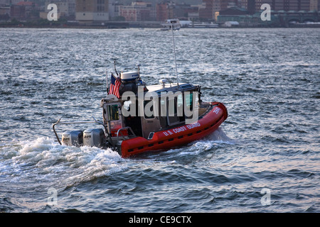 25 foot Defender Class US Coast Guard Patrol boat (RB-S) on the Hudson River in New York City at dusk Stock Photo