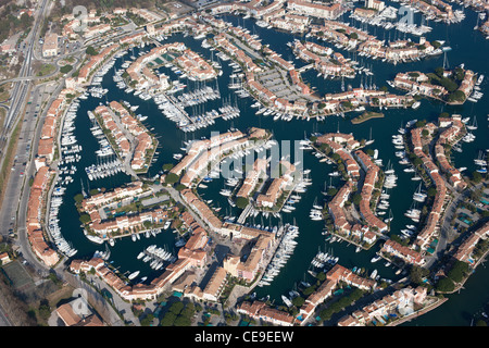 AERIAL VIEW. The seaside town of Port Grimaud, created in the 60s on a marshy land. Gulf of Saint-Tropez, Var, French Riviera, France. Stock Photo