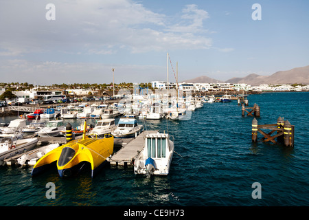 Moored boats in Playa Blanca harbour,  Lanzarote, Spain Stock Photo