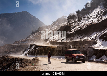India, Arunachal Pradesh, Tawang Valley, Jang, low cloud clearing from hairpin bends on steep road to Sela Pass Stock Photo