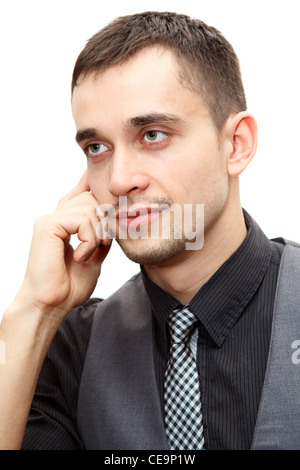Portrait of a smiling Caucasian businessman talking on cellphone isolated over white background Stock Photo