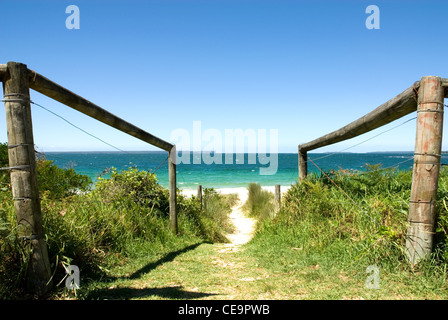 A walkway leading to a sandy beach at Jervis Bay, New South Wales, Australia Stock Photo