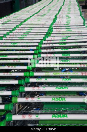 Asda shopping trolleys stacked up in a line Stock Photo