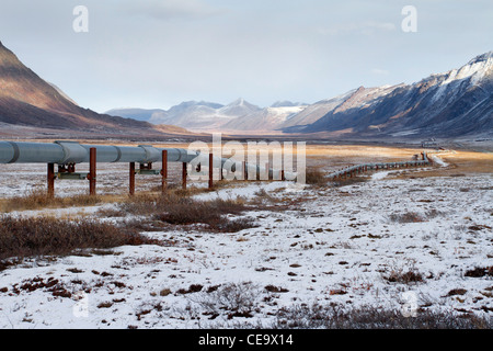 Scenic snowy winter mountainous landscape in Brooks Range, North Slope, Alaska in October showing Trans Alaska pipeline Stock Photo