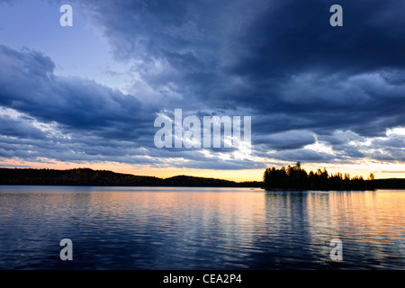 Dramatic sunset at Lake of Two Rivers in Algonquin Park, Ontario, Canada Stock Photo