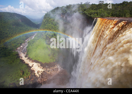 Rainbow over Kaieteur Falls, Potaro River, Guyana, South America, reputedly the world's largest single-drop waterfall. Stock Photo