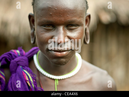 Young Surma Woman With Extended Ear Lobes Tricky Look Ethiopia Stock Photo