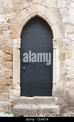 Old door with sliding bolt Stock Photo