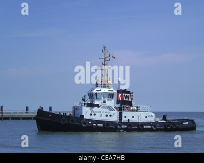 The tugboat Taucher O. Wulf 3 in the port of Cuxhaven Stock Photo