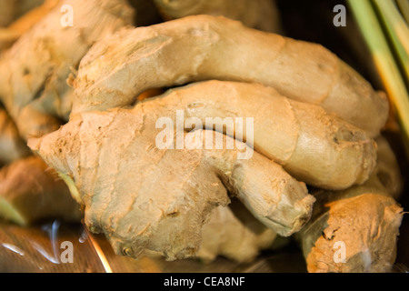 Borough Market London basket pile of fresh ginger roots greengrocer vegetable stall shop store Stock Photo