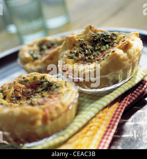 Mini tartes with cheese and bacon Stock Photo