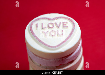 I love you love heart sweets on red background Stock Photo