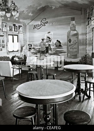 Retro wine bar and vintage style restaurant with decor and furnishings in 1950's style interior. Black and white photography Stock Photo