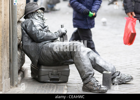 Street Artist performing  for money  on the streets of Rome Italy Stock Photo