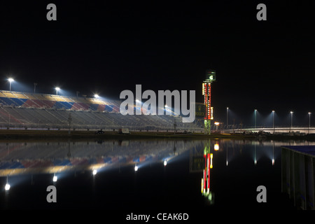 Backstretch grandstand reflected on Lake Lloyd during 2012 Rolex 24 at Daytona International Speedway Stock Photo