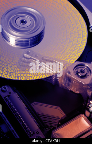 studio photography of a opened hard disk at work with symbolic data while processing Stock Photo