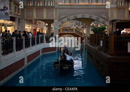 Gondola on the Grand Canal in the shopping mall part of  the Venetian Casino and Hotel Complex, Cotai Strip Macau SAR China Stock Photo