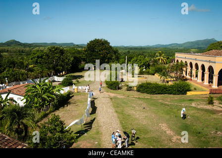 cuba valle de los ingenios cotton goods for sale in local market and general view of the valley and the Manaca Iznaga house Stock Photo