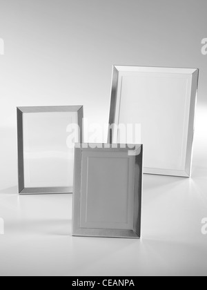 A still life shot of a trio of silver photo frames Stock Photo