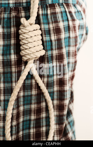Woman holding a noose on her back Stock Photo