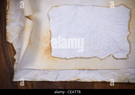Stack old papers on a wooden table Stock Photo