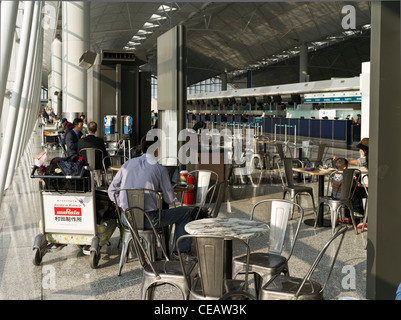 dh Hong Kong Airport CHEK LAP KOK HONG KONG Hong Kong International Airport Terminal 1 Cathay Pacific departures lounge passengers people hk Stock Photo
