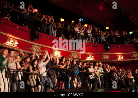 Audience at a concert at KOKO, a nightclub in a former theatre in Camden Town, London, UK, Stock Photo