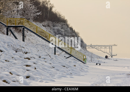 Snow-covered beach in Rewal, on the west coast of the Baltic Sea in Poland. Winter on the Baltic Sea. Stock Photo