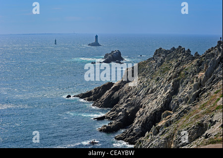 The lighthouse La Vieille at the Pointe du Raz at Plogoff, Finistère, Brittany, France Stock Photo