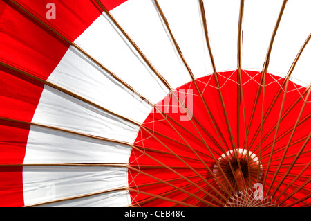 Traditional Japanese red and white paper umbrella Stock Photo