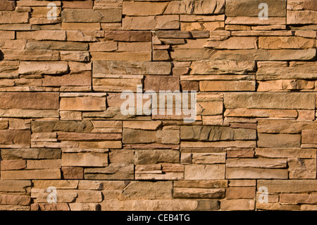 Irregular sized brown bricks with an organic feel. Image is seamlessly tileable Stock Photo