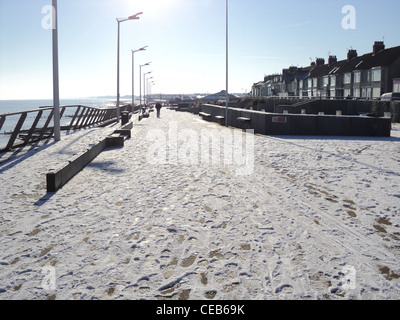 Beach in snow at Hornsea, UK, a lovely town along Yorkshire Coast . Landscape dated 2012 January. Stock Photo