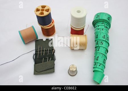 basic sewing kit including a thimble and a tape measure. Stock Photo
