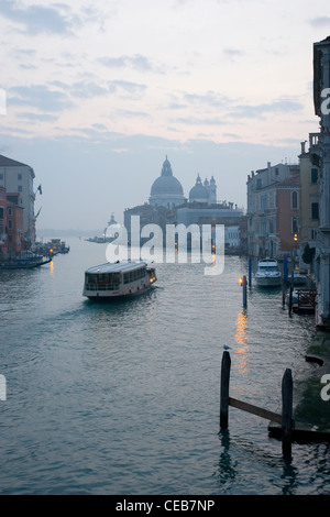 Venice, Veneto, Italy. View along the Grand Canal from the Ponte dell'Accademia, dawn. Stock Photo