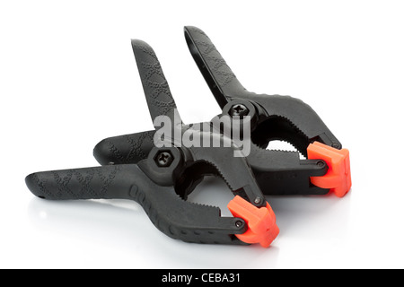 Black plastic clamps isolated on white Stock Photo
