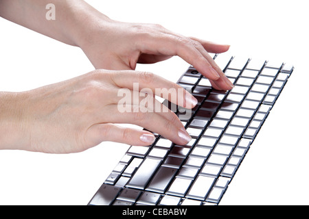 Female hands typing, isolated on white background Stock Photo
