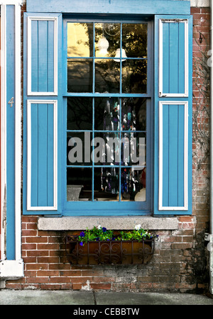 Blue shutters window and sidewalk in Cyprus Stock Photo - Alamy