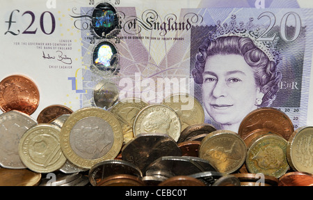 english bank note and coins showing queens head Stock Photo