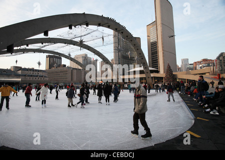 Ice skating in front of Toronto city hall, Ontario, Canada Stock Photo