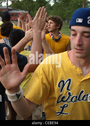 Ball players congratulating each other after game, McCarren Park, Brooklyn, New York Stock Photo