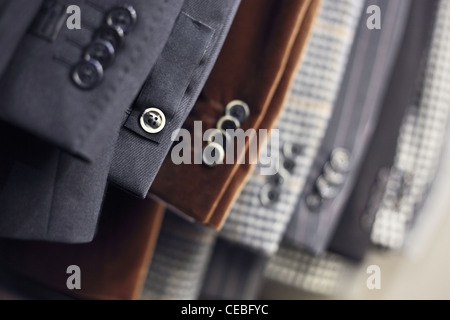 Detail of men's jackets' line in a shop, DOF Stock Photo